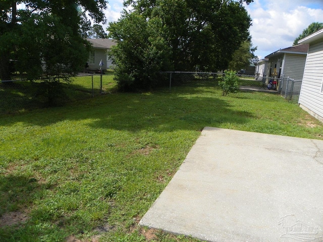 view of yard with a fenced backyard and a patio