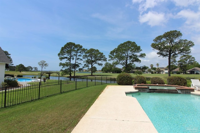 3756 Bengal Rd, Gulf Breeze, FL 32563 - view of pool featuring a lawn, a pool with connected hot tub, and fence
