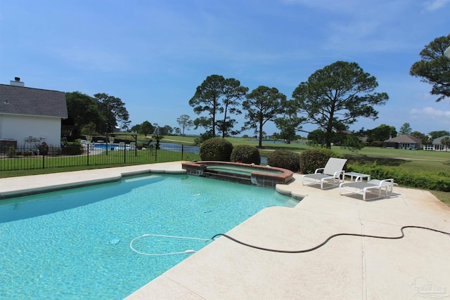 3756 Bengal Rd, Gulf Breeze, FL 32563 - view of pool featuring a lawn, a pool with connected hot tub, fence, and a patio area