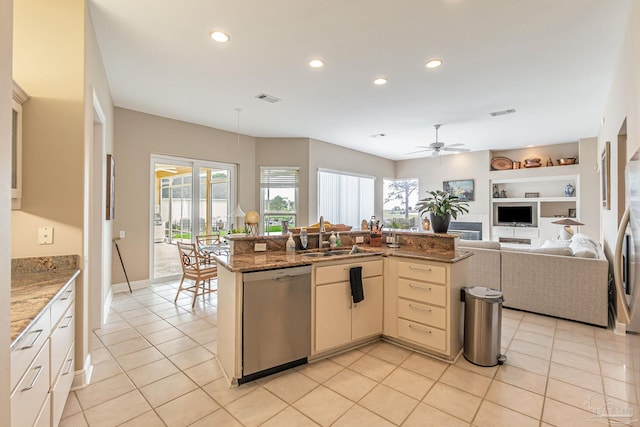 3756 Bengal Rd, Gulf Breeze, FL 32563 - kitchen with a ceiling fan, open floor plan, built in shelves, a sink, and dishwasher