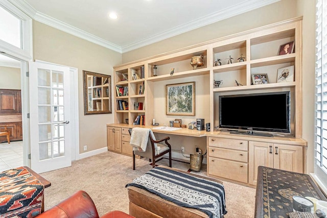 3756 Bengal Rd, Gulf Breeze, FL 32563 - home office with ornamental molding, built in study area, baseboards, light colored carpet, and built in shelves