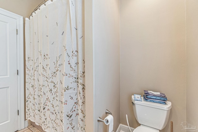 3756 Bengal Rd, Gulf Breeze, FL 32563 - full bath featuring toilet, baseboards, a shower with curtain, and tile patterned flooring