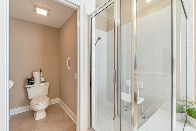 3756 Bengal Rd, Gulf Breeze, FL 32563 - bathroom with toilet, baseboards, tile patterned flooring, and a stall shower
