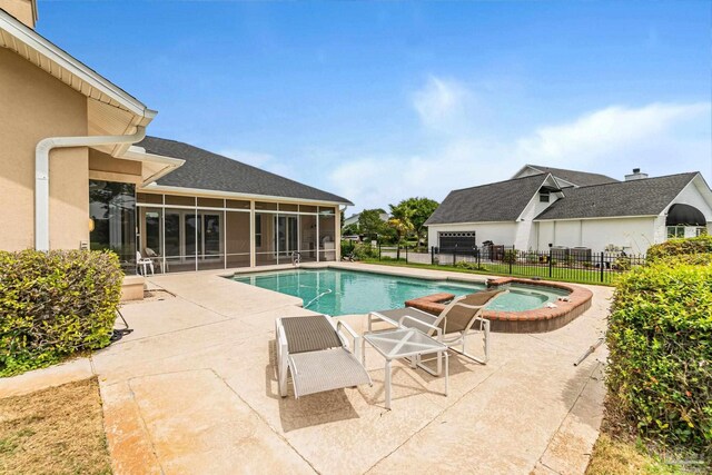 3756 Bengal Rd, Gulf Breeze, FL 32563 - view of pool featuring a sunroom, fence, a pool with connected hot tub, and a patio