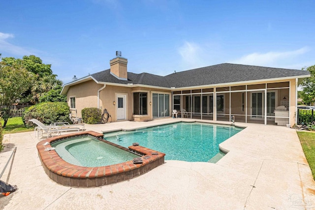 3756 Bengal Rd, Gulf Breeze, FL 32563 - view of pool featuring a sunroom, a pool with connected hot tub, and a patio