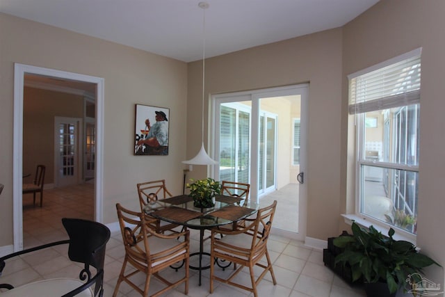 3756 Bengal Rd, Gulf Breeze, FL 32563 - dining room featuring plenty of natural light, baseboards, and light tile patterned floors