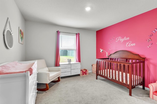 4744 Perception Cir, Milton, FL 32570 - carpeted bedroom with a crib and baseboards