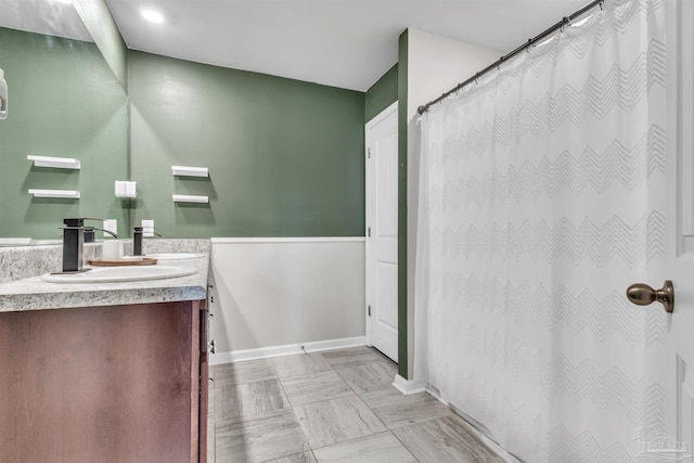 4744 Perception Cir, Milton, FL 32570 - bathroom with vanity and a shower with shower curtain