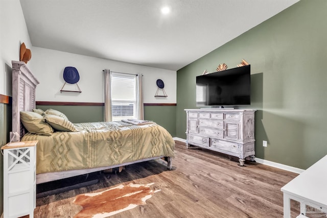 4744 Perception Cir, Milton, FL 32570 - bedroom featuring wood finished floors and baseboards