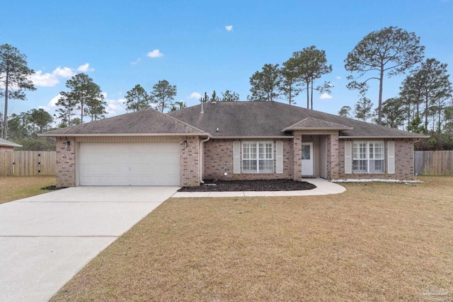 ranch-style house featuring a garage and a front lawn