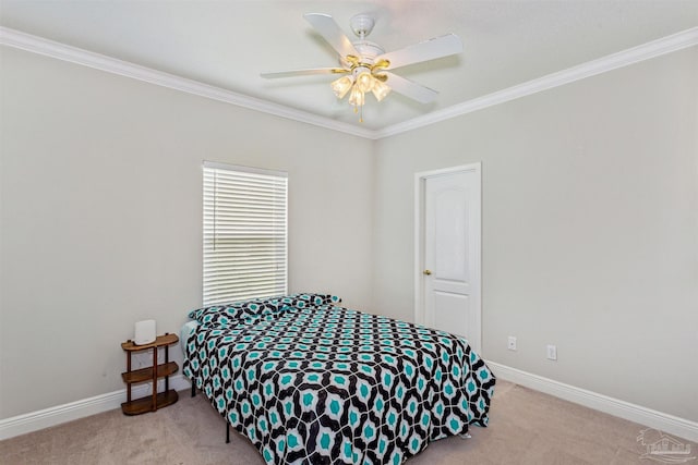 bedroom with ornamental molding, light colored carpet, and ceiling fan