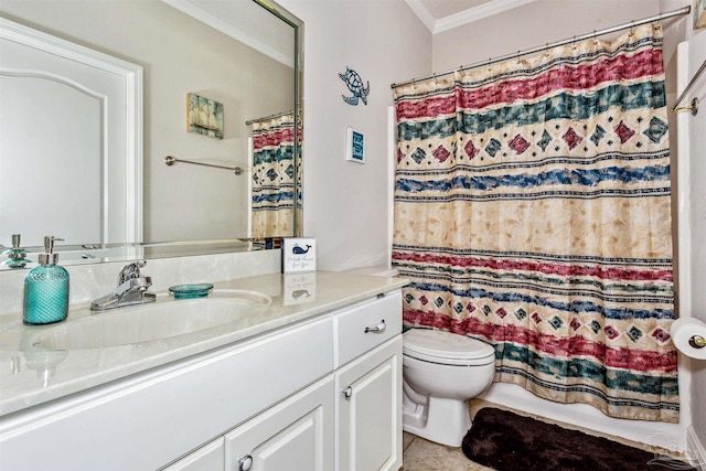 bathroom with crown molding, toilet, vanity, and a shower with curtain