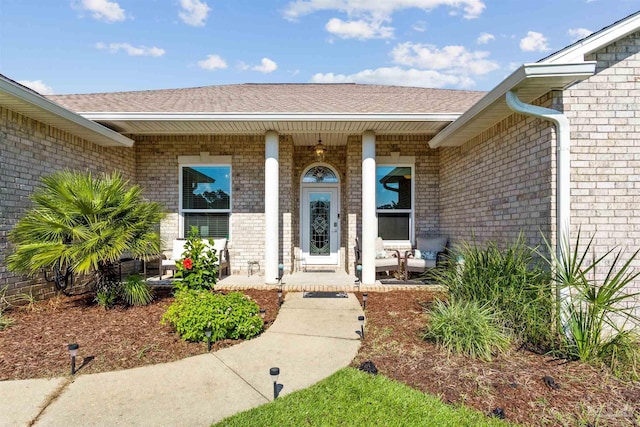 entrance to property with a porch