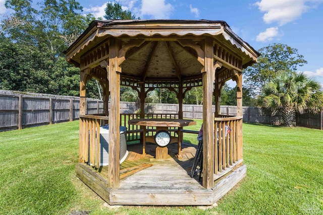 view of community featuring a gazebo and a yard