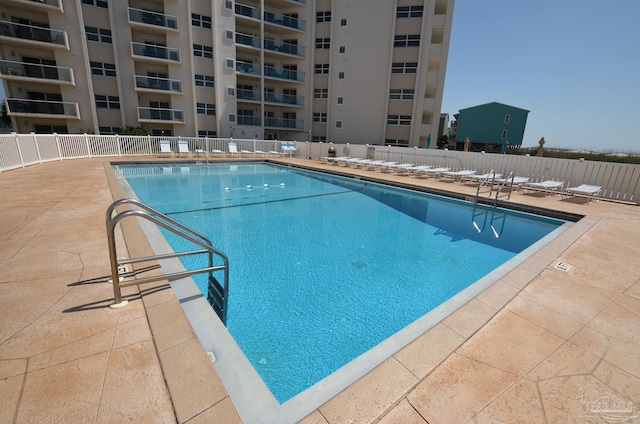 pool featuring fence