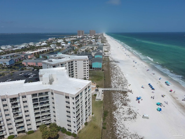 birds eye view of property featuring a water view and a view of the beach