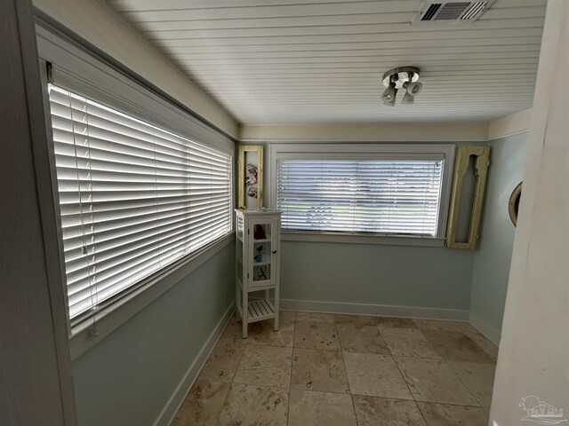 1726 N 15th Ave, Pensacola, FL 32503 - spare room with baseboards
