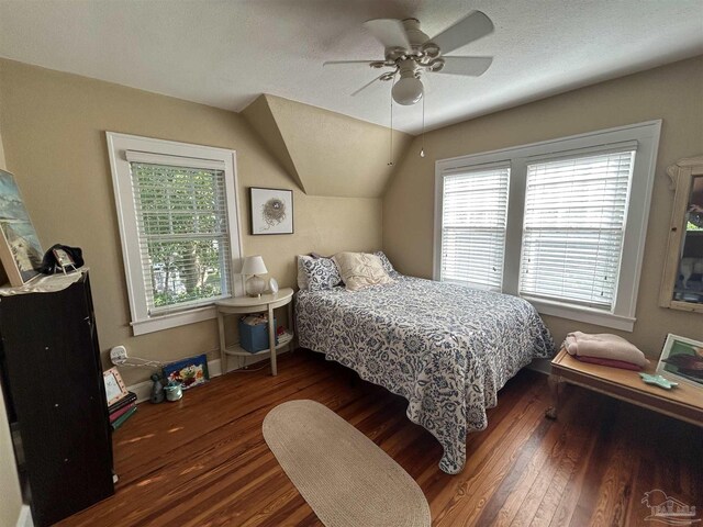 1726 N 15th Ave, Pensacola, FL 32503 - bedroom featuring wood finished floors, multiple windows, lofted ceiling, and a ceiling fan