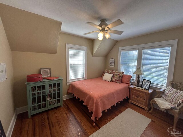 1726 N 15th Ave, Pensacola, FL 32503 - bedroom featuring wood finished floors, multiple windows, baseboards, and ceiling fan