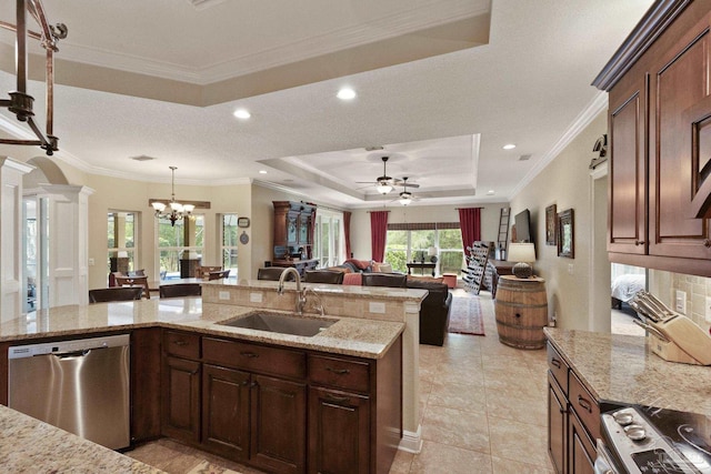 2926 Greystone Dr, Pace, FL 32571 - kitchen with stainless steel appliances, a sink, a tray ceiling, a chandelier, and ceiling fan