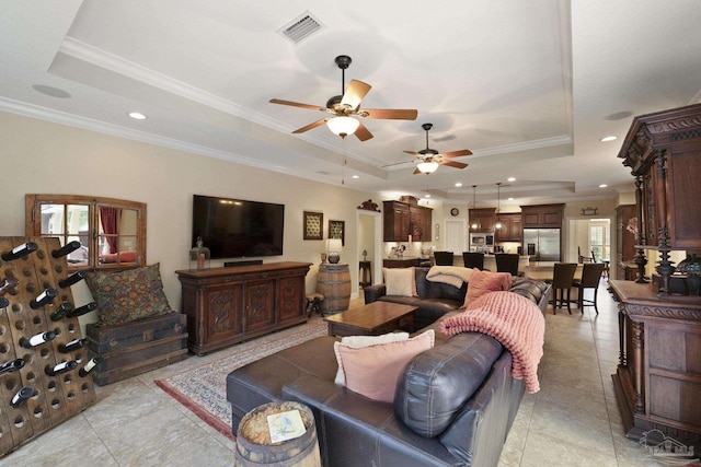 2926 Greystone Dr, Pace, FL 32571 - living area with a raised ceiling, ceiling fan, crown molding, recessed lighting, and light tile patterned floors