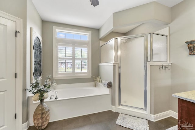 2926 Greystone Dr, Pace, FL 32571 - full bath with a bath, a shower stall, vanity, and baseboards