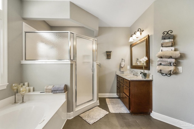 2926 Greystone Dr, Pace, FL 32571 - full bath with baseboards, a stall shower, a bath, and vanity