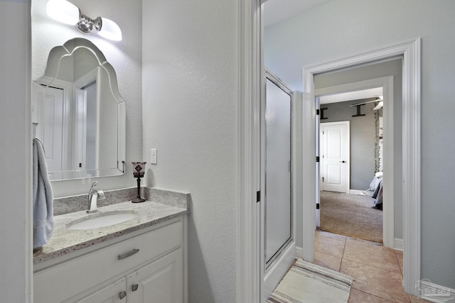 2926 Greystone Dr, Pace, FL 32571 - bathroom featuring a shower stall, vanity, and tile patterned flooring