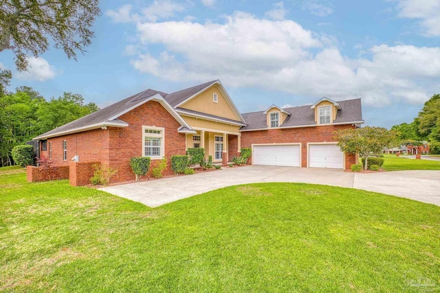 2926 Greystone Dr, Pace, FL 32571 - view of front facade with brick siding, driveway, a front lawn, a garage, and a shingled roof