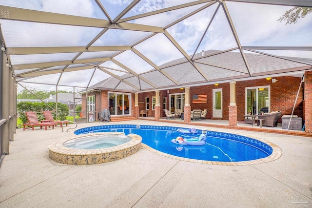 2926 Greystone Dr, Pace, FL 32571 - view of swimming pool with an outdoor hangout area, a patio area, a pool with connected hot tub, and glass enclosure