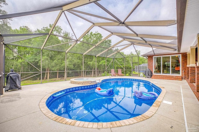 2926 Greystone Dr, Pace, FL 32571 - view of swimming pool featuring a patio, a pool with connected hot tub, and a lanai