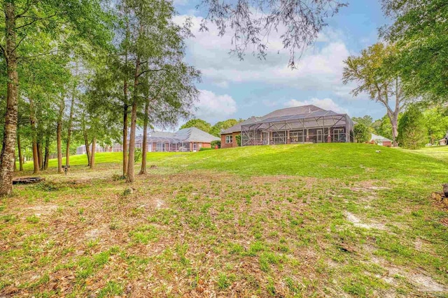 2926 Greystone Dr, Pace, FL 32571 - view of grassy yard featuring a lanai