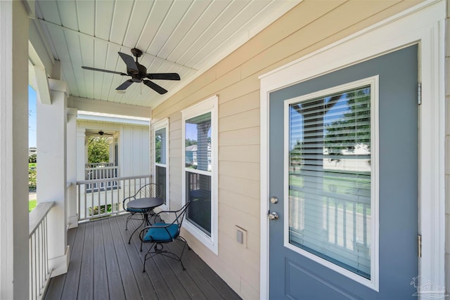 wooden deck with ceiling fan