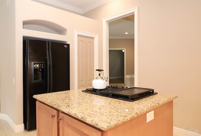 4436 Soundside Dr, Gulf Breeze, FL 32563 - kitchen featuring black appliances, a kitchen island, crown molding, light stone counters, and baseboards