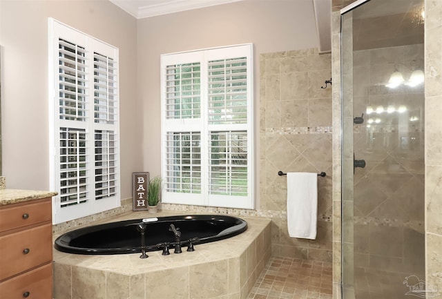 4436 Soundside Dr, Gulf Breeze, FL 32563 - bathroom with a garden tub, a stall shower, crown molding, and vanity