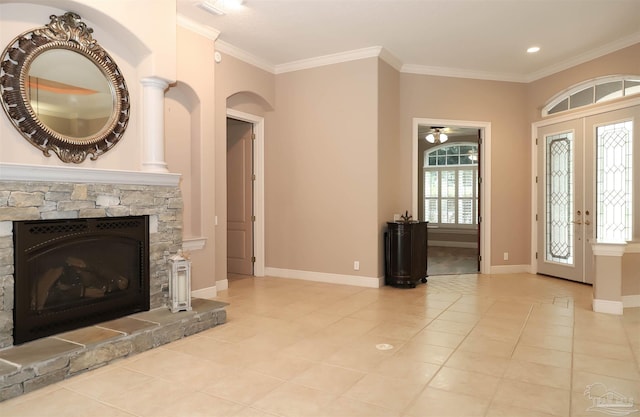 4436 Soundside Dr, Gulf Breeze, FL 32563 - tiled entrance foyer with baseboards, crown molding, a fireplace, ceiling fan, and recessed lighting