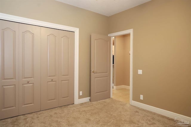 4436 Soundside Dr, Gulf Breeze, FL 32563 - unfurnished bedroom featuring carpet flooring, a closet, and baseboards