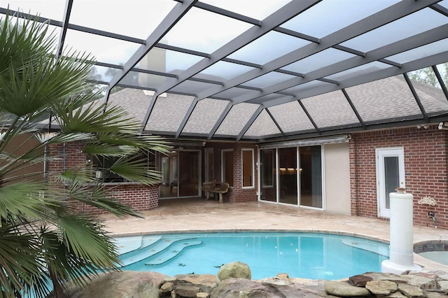 4436 Soundside Dr, Gulf Breeze, FL 32563 - swimming pool with a patio area and glass enclosure