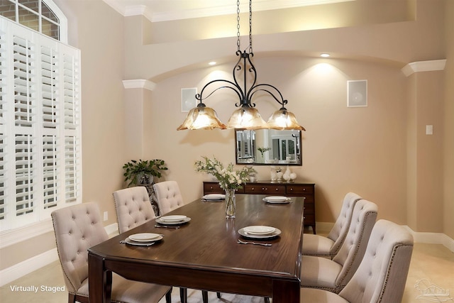 4436 Soundside Dr, Gulf Breeze, FL 32563 - dining room featuring crown molding and baseboards