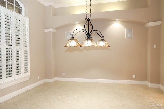 4436 Soundside Dr, Gulf Breeze, FL 32563 - spare room with ornamental molding, tile patterned flooring, a chandelier, and baseboards