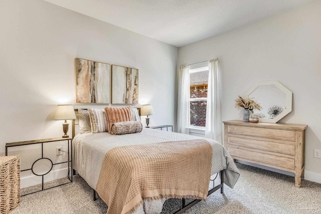 4680 Eider Rd, Pace, FL 32571 - bedroom with baseboards and light carpet