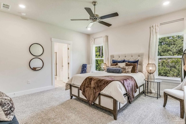 4680 Eider Rd, Pace, FL 32571 - bedroom with multiple windows, carpet floors, recessed lighting, connected bathroom, and ceiling fan