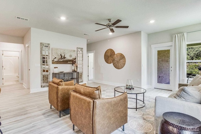 4680 Eider Rd, Pace, FL 32571 - living room with light wood-style flooring, a ceiling fan, and recessed lighting