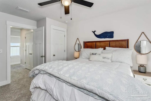 carpeted bedroom featuring ceiling fan