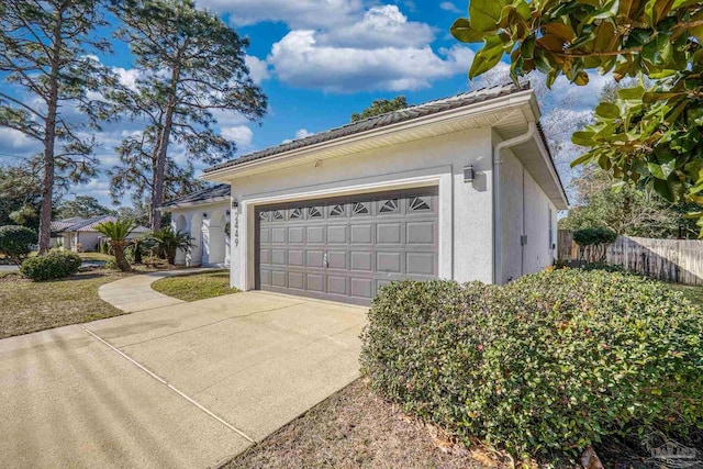 view of side of property featuring a garage