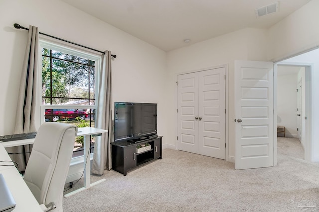 office featuring visible vents, carpet flooring, and baseboards