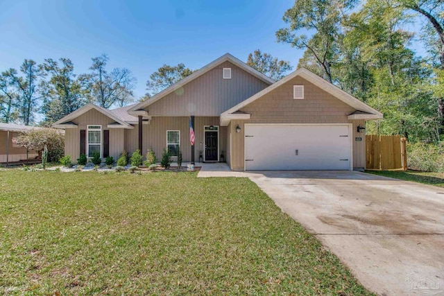 view of front of home featuring an attached garage, concrete driveway, a front lawn, and fence