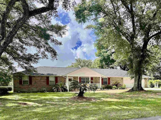 1405 Aquila Dr, Pensacola, FL 32514 - single story home featuring a front yard, brick siding, and covered porch