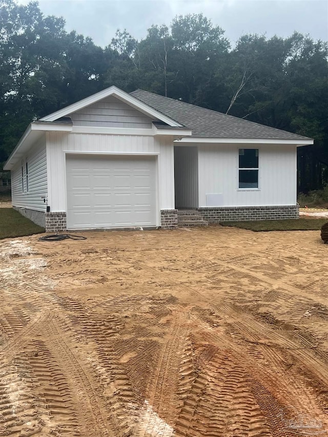 ranch-style house with a garage