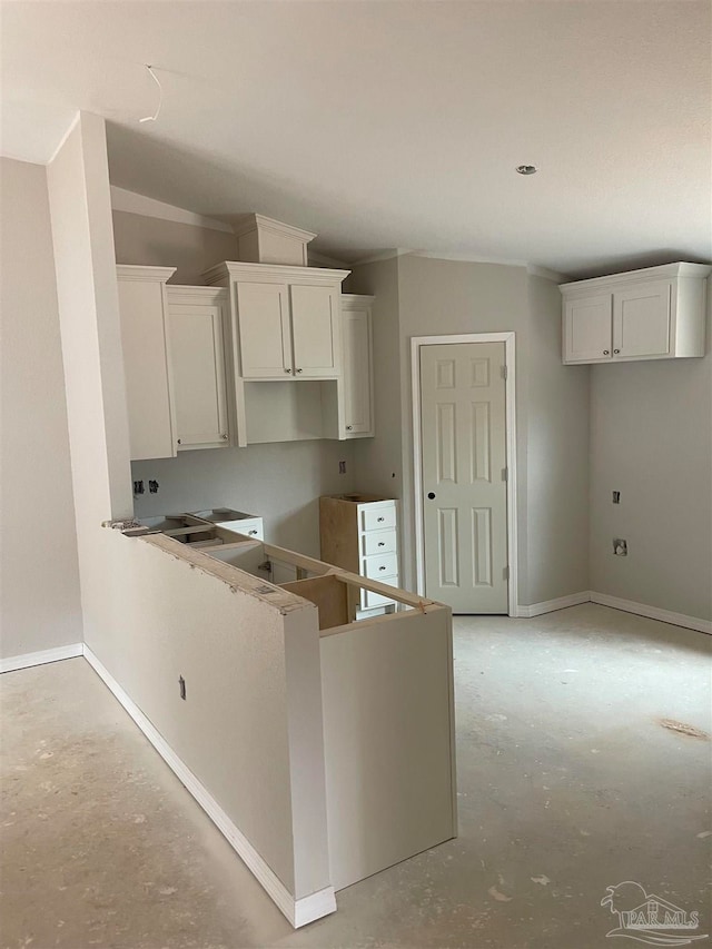 kitchen featuring white cabinetry